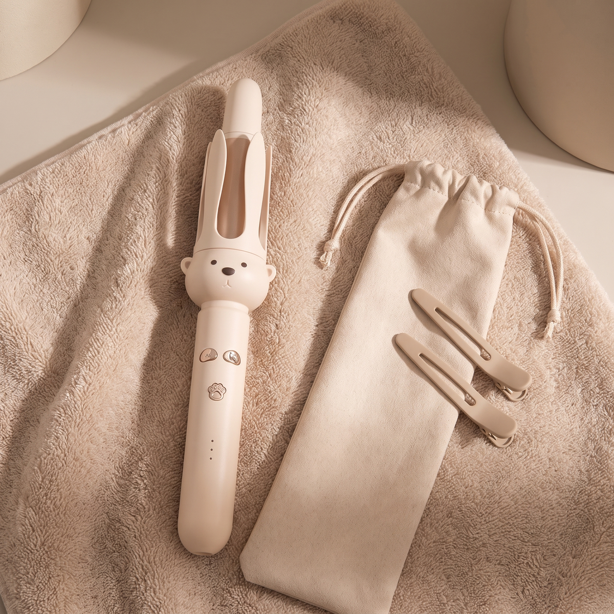 Maren curling wand flat lay with travel pouch